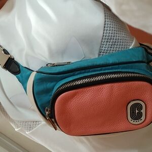 Coach Colorblock Pebbled Leather Belt Bag in Coral and Teal